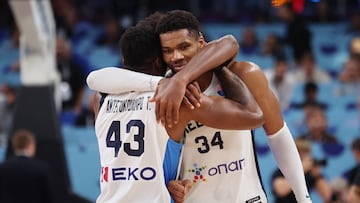 Basketball - FIBA EuroBasket 2025 - Third Place Game - Greece v Finland - Xiaomi Arena, Riga, Latvia - September 14, 2025 Greece's Giannis Antetokounmpo and Thanasis Antetokounmpo celebrate winning the match REUTERS/Yiannis Kourtoglou
