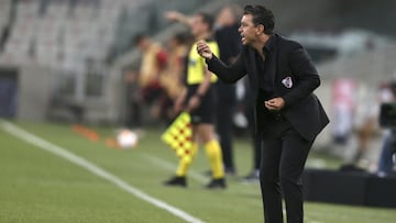 Coach Marcelo Gallardo of Argentina's River Plate reacts during a Copa Libertadores soccer match against Brazil's Paranaense in Curitiba, Brazil, Tuesday, Nov. 24, 2020. (Rodolfo Buhrer, Pool via AP)