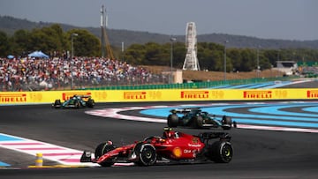 LE CASTELLET, FRANCE - JULY 24: Carlos Sainz of Spain driving (55) the Ferrari F1-75 leads Lance Stroll of Canada driving the (18) Aston Martin AMR22 Mercedes during the F1 Grand Prix of France at Circuit Paul Ricard on July 24, 2022 in Le Castellet, France. (Photo by Joe Portlock - Formula 1/Formula 1 via Getty Images)