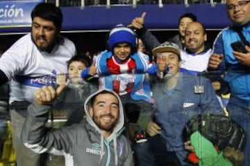 Hinchas de Universidad Catolica alientan a su equipo antes del partido de Super Copa contra Universidad de Chile disputado en el estadio Ester Roa de Concepcion, Chile.