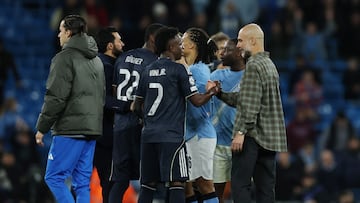Soccer Football - UEFA Champions League - Round 16 - Second Leg - Manchester City v Real Madrid - Etihad Stadium, Manchester, Britain - March 17, 2026 Real Madrid's Vinicius Junior shakes hands with Manchester City manager Pep Guardiola after the match Action Images via Reuters/Lee Smith
