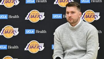 Slovenian basketball player Luka Doncic looks on during a press conference introducing him as the newest member of the Los Angeles Lakers, at the UCLA Health Training Center, in El Segundo, California on February 4, 2025. Slovenian star Luka Doncic said February 2, 2025 he thought he'd spend his entire NBA career in Dallas, thanking fans in Texas for making it feel like home a day after the Mavericks abruptly traded him to the Los Angeles Lakers. (Photo by Patrick T. Fallon / AFP)