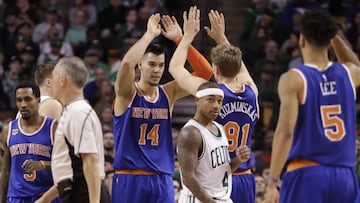 Jan 18, 2017; Boston, MA, USA; New York Knicks center Willy Hernangomez (14) and forward Mindaugas Kuzminskas (91) react after a play against the Boston Celtics in the second half at TD Garden. The Knicks defeated the Celtics 117-106. Mandatory Credit: David Butler II-USA TODAY Sports