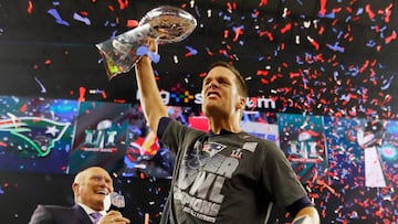 HOUSTON, TX - FEBRUARY 05: Tom Brady #12 of the New England Patriots celebreates with the Vince Lombardi Trophy after defeating the Atlanta Falcons during Super Bowl 51 at NRG Stadium on February 5, 2017 in Houston, Texas. The Patriots defeated the Falcons 34-28.   Kevin C. Cox/Getty Images/AFP
 == FOR NEWSPAPERS, INTERNET, TELCOS &amp; TELEVISION USE ONLY ==