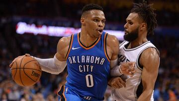 Mar 10, 2018; Oklahoma City, OK, USA; Oklahoma City Thunder guard Russell Westbrook (0) drives to the basket in front of San Antonio Spurs guard Patty Mills (8) during the second quarter at Chesapeake Energy Arena. Mandatory Credit: Mark D. Smith-USA TODA