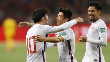 Soccer Football - World Cup - Asia Qualifiers - Second Round - Group A - Guam v China - Suzhou Olympic Sports Center, Suzhou, Jiangsu province, China - May 30, 2021 China's Lei Wu celebrates scoring their third goal with teammates REUTERS/Aly Song