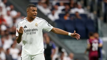 Real Madrid's French forward #09 Kylian Mbappe reacts during the Spanish league football match between Real Madrid CF and Real Valladolid FC at the Santiago Bernabeu stadium in Madrid on August 25, 2024. (Photo by Pierre-Philippe MARCOU / AFP)