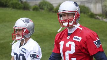 (Foxborough, MA 5/25/17) New England Patriots wide receiver Danny Amendola (80), left, and New England Patriots quarterback Tom Brady (12) walk out onto the field together during practice at Gillette Stadium in Foxborough on Thursday, May 25, 2017. Staff