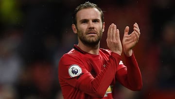 Juan Mata's cool finish sends United through to the next round