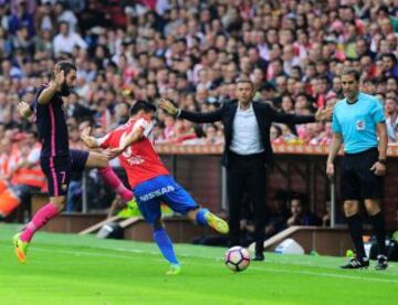 Arda Turan y Sergio Álvarez.