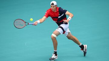 MIAMI GARDENS, FLORIDA - MARCH 29: John Isner of USA in action against Felix Auger-Aliassime of Canada in the semi final during day twelve of the Miami Open tennis on March 29, 2019 in Miami Gardens, Florida.   Julian Finney/Getty Images/AFP
 == FOR NEWSPAPERS, INTERNET, TELCOS &amp; TELEVISION USE ONLY ==