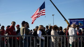 People stand in line to attend a campaign rally in support of Republican US Senate candidate, J.D. Vance, on the eve of the US midterm elections.