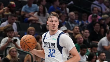 Oct 11, 2025; Dallas, Texas, USA; Dallas Mavericks forward Cooper Flagg (32) brings the ball up court against the Charlotte Hornets in the second half of a game at American Airlines Center. Mandatory Credit: Raymond Carlin III-Imagn Images