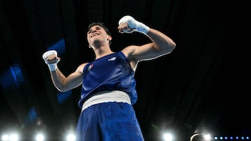 Mexico's Marco Alonso Verde Alvarez (Blue) reacts after beating Britain's Lewis Richardson in the men's 71kg semi-final boxing match during the Paris 2024 Olympic Games at the Roland-Garros Stadium, in Paris on August 6, 2024. (Photo by MOHD RASFAN / AFP)