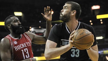 Jan 21, 2017; Memphis, TN, USA; Memphis Grizzlies center Marc Gasol (33) handles the ball against Houston Rockets guard James Harden (13) during the first at FedExForum. Mandatory Credit: Justin Ford-USA TODAY Sports