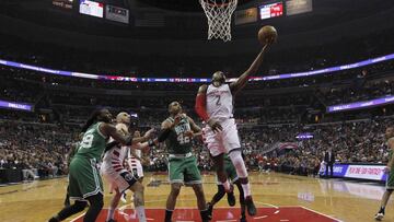 May 12, 2017; Washington, DC, USA; Washington Wizards guard John Wall (2) shoots the ball as Boston Celtics center Al Horford (42) looks on in the first quarter in game six of the second round of the 2017 NBA Playoffs at Verizon Center. The Wizards won 92-91, and tied the series at 3-3. Mandatory Credit: Geoff Burke-USA TODAY Sports