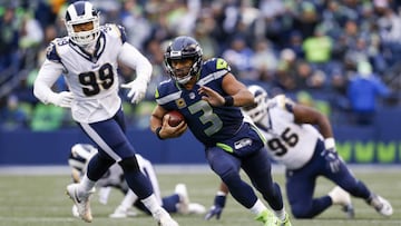 Dec 17, 2017; Seattle, WA, USA; Seattle Seahawks quarterback Russell Wilson (3) runs the ball against the Los Angeles Rams during the third quarter at CenturyLink Field. Mandatory Credit: Joe Nicholson-USA TODAY Sports