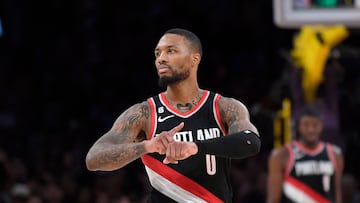 Damian Lillard #0 of the Portland Trail Blazers celebrates as he points to his wrist after scoring a three-pot basket in the closing seconds of the game against Los Angeles Lakers at Crypto.com Arena on October 23, 2022 in Los Angeles, California.