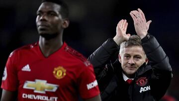 Manchester United manager Ole Gunnar Solskjaer claps after the English Premier League match between Cardiff City and Manchester United at the Cardiff City Stadium in Cardiff, Wales, Saturday Dec. 22, 2018. (AP Photo/ Jon Super)