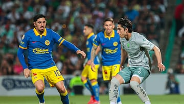Diego Valdes (L) of America fights for the ball with Alan Cervantes (R) of Santos during the 14th round match between Santos and America as part of the Torneo Clausura 2024 Liga BBVA MX at TSM, Corona Stadium on April 06, 2024 in Torreon, Coahuila, Mexico.