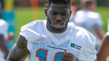 MIAMI GARDENS, FL - JUNE 1: Tyreek Hill #10 of the Miami Dolphins warms up during the Miami Dolphins OTAs at the Baptist Health Training Complex on June 1, 2022 in Miami Gardens, Florida. (Photo by Joel Auerbach/Getty Images)