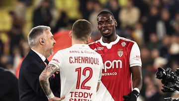 Soccer Football - Ligue 1 - AS Monaco v Paris St Germain - Stade Louis II, Monaco - November 29, 2025 AS Monaco's Paul Pogba celebrates with Caio Henrique after the match REUTERS/Manon Cruz