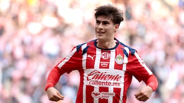 Guadalajara's forward #34 Armando Gonzalez celebrates after scoring during the Liga MX Apertura football match between Guadalajara and Monterrey at the Akron Stadium in Zapopan, Mexico on November 8, 2025. (Photo by Ulises Ruiz / AFP)