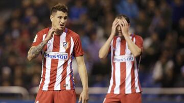 Giménez y Godín, con el Atlético. Serán titulares ante el Eibar.
