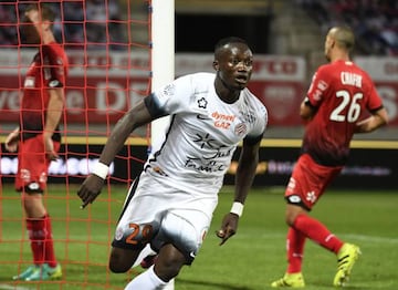 Montpellier's Chadian forward Casimir Ninga celebrates after scoring during the French L1 football match between Dijon FCO (DFCO) and Montpellier HSC (MHSC) at the Gaston Gerard stadium in Dijon