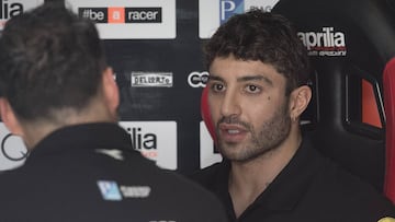 DOHA, QATAR - FEBRUARY 24: Andrea Iannone of Italy and Aprilia Racing Team Gresini speaks in box during the MotoGP Tests - Day Two at Losail Circuit on February 24, 2019 in Doha, Qatar. (Photo by Mirco Lazzari gp/Getty Images)