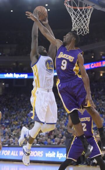 Draymond Green y Ronnie Price.