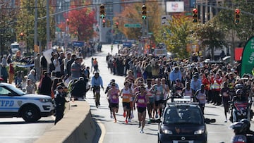 Two million spectators are set to pack the streets as New Yorkers celebrate the marathon with music, posters, and plenty of spirit.