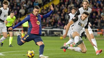 Barcelona's Spanish forward #07 Ferran Torres kicks the ball during the Spanish league football match between FC Barcelona and Valencia CF at the Estadi Olimpic Lluis Companys in Barcelona on January 26, 2025. (Photo by MANAURE QUINTERO / AFP)