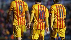  Luis Suarez, Lionel Messi and Neymar JR of Barcelona walk on the pitch during the La Liga match between Levante UD and FC Barcelona at Ciutat de Valencia 