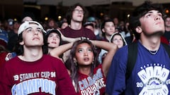 People react at a watch party near Ball Arena during Game Five of the 2022 NHL Stanley Cup Final between the Tampa Bay Lightning and the Colorado Avalanche