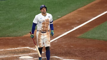TORONTO, ONTARIO - OCTOBER 25: George Springer #4 of the Toronto Blue Jays reacts after striking out against Yoshinobu Yamamoto #18 of the Los Angeles Dodgers during the eighth inning in game two of the 2025 World Series at Rogers Center on October 25, 2025 in Toronto, Ontario. Patrick Smith/Getty Images/AFP (Photo by Patrick Smith / GETTY IMAGES NORTH AMERICA / Getty Images via AFP)