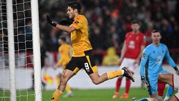 Wolverhampton Wanderers' Mexican striker Raul Jimenez scores the equalising goal during the English League Cup quarter-final football match between Nottingham Forest and Wolverhampton Wanderers at The City Ground in Nottingham, central England, on January 11, 2023. (Photo by Paul ELLIS / AFP) / RESTRICTED TO EDITORIAL USE. No use with unauthorized audio, video, data, fixture lists, club/league logos or 'live' services. Online in-match use limited to 120 images. An additional 40 images may be used in extra time. No video emulation. Social media in-match use limited to 120 images. An additional 40 images may be used in extra time. No use in betting publications, games or single club/league/player publications. /