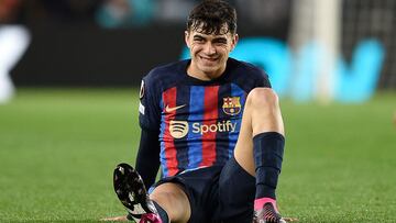 Barcelona's Spanish midfielder Pedri reacts after a fall during the UEFA Europa League round of 32 first-leg football match between FC Barcelona and Manchester United at the Camp Nou stadium in Barcelona, on February 16, 2023. (Photo by Josep LAGO / AFP)