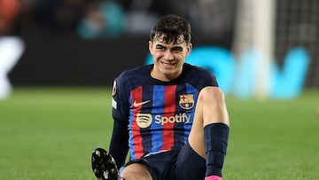 Barcelona's Spanish midfielder Pedri reacts after a fall during the UEFA Europa League round of 32 first-leg football match between FC Barcelona and Manchester United at the Camp Nou stadium in Barcelona, on February 16, 2023. (Photo by Josep LAGO / AFP)