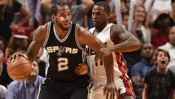 Oct 30, 2016; Miami, FL, USA; San Antonio Spurs forward Kawhi Leonard (2) is pressured by Miami Heat guard Dion Waiters (11) during the second half at American Airlines Arena. The Spurs won 106-99.  Mandatory Credit: Steve Mitchell-USA TODAY Sports