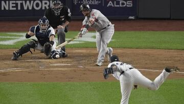 Boston Red Sox&#039;s Christian Vazquez connects for an infield ground ball which was deflected by New York Yankees starting pitcher Luis Severino during the second inning of Game 3 of baseball&#039;s American League Division Series, Monday, Oct. 8, 2018,