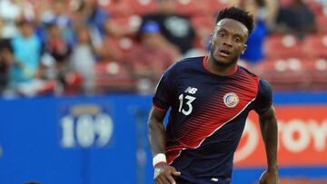 FRISCO, TX - JULY 14: Rodney Wallace #13 of Costa Rica scores a goal against Donovan Leon #22 of French Guiana during the 2017 CONCACAF Gold Cup at Toyota Stadium on July 14, 2017 in Frisco, Texas.   Ronald Martinez/Getty Images/AFP
 == FOR NEWSPAPERS, INTERNET, TELCOS &amp; TELEVISION USE ONLY ==