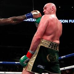 Wilder mantiene su trono tras un polémico nulo con Fury