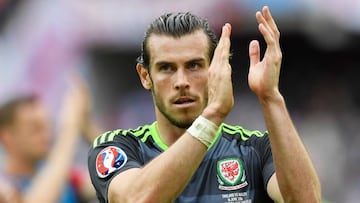 Gareth Bale of Wales applauds supporters. 