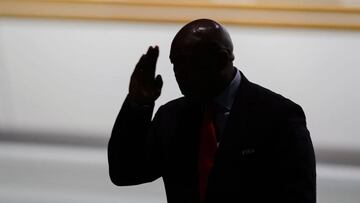 FIFA presidential contender South Africa&#039;s Tokyo Sexwale waves as he leaves the stage after he withdrew from election at the FIFA electoral congress on February 26, 2016 in Zurich. 
 FIFA members will elect on February 26, 2016 a new president and pa
