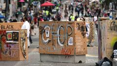 SEATTLE, WA - JUNE 19: Barricades erected by the city several days ago divide up the CHOP zone on June 19, 2020 in Seattle, Washington. The concrete barriers, wrapped in plywood for painting, were installed to protect the free speech zone while still allo