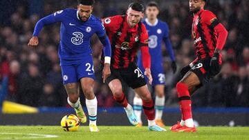 Chelsea's Reece James (left) battles for the ball with Bournemouth's Kieffer Moore and Dominic Solanke (right) during the Premier League match at Stamford Bridge, London. Picture date: Tuesday December 27, 2022. (Photo by John Walton/PA Images via Getty Images)