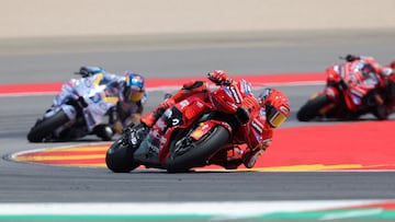 Team Ducati Lenovo Team's Marc Marquez rides ahead of his brother Team Gresini Racing MotoGP's Alex Marquez during the MotoGP Aragon Grand Prix at the Motorland circuit in Alcaniz, northeastern Spain, on June 8, 2025. (Photo by LLUIS GENE / AFP)