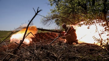 A Ukrainian service member from a 28th separate mechanised brigade named after the Knights of the Winter Campaign of the Armed Forces of Ukraine, fires an anti-tank grenade launcher at a front line, amid Russia's attack on Ukraine, near the city of Bakhmut, Ukraine May 3, 2023. REUTERS/Sofiia Gatilova     TPX IMAGES OF THE DAY