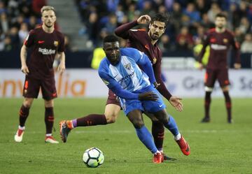 Isaac Success y André Gomes.